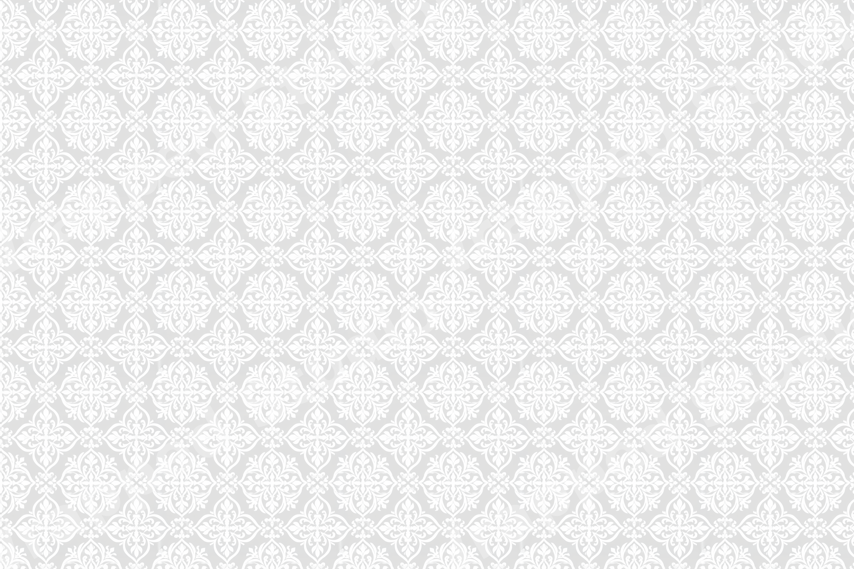 Elegant vintage damask pattern with intricate white floral motifs on a light gray background.