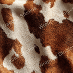 Cream and brown animal print pattern resembling cowhide.