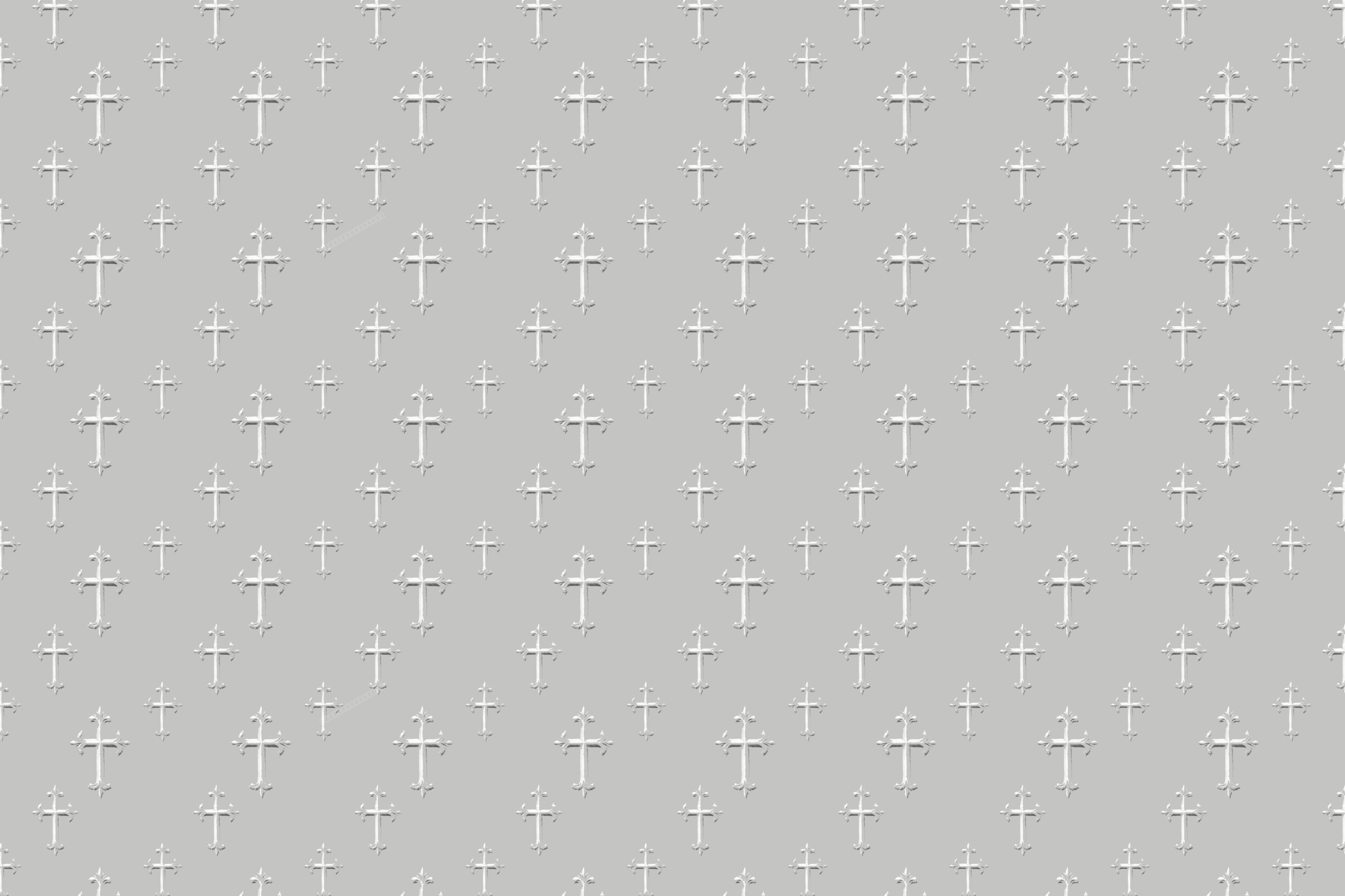 Elegant seamless pattern featuring embossed silver and white Christian crosses on a light grey background.