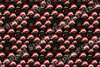 Festive Christmas pattern featuring illustrated Black Santa Claus faces on a black background.
