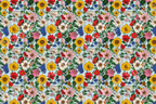 Seamless floral pattern with colorful sunflowers, roses, and wildflowers on a light blue background.