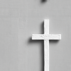 Minimalist white Christian cross pattern on a textured gray background.