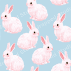 Cute seamless bunny pattern featuring fluffy pink rabbits on a pastel blue background.