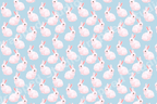 Cute watercolor bunny pattern featuring soft pink rabbits on a pastel blue background.