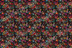 A colorful, retro seamless pattern with painted vinyl records on a black ground.