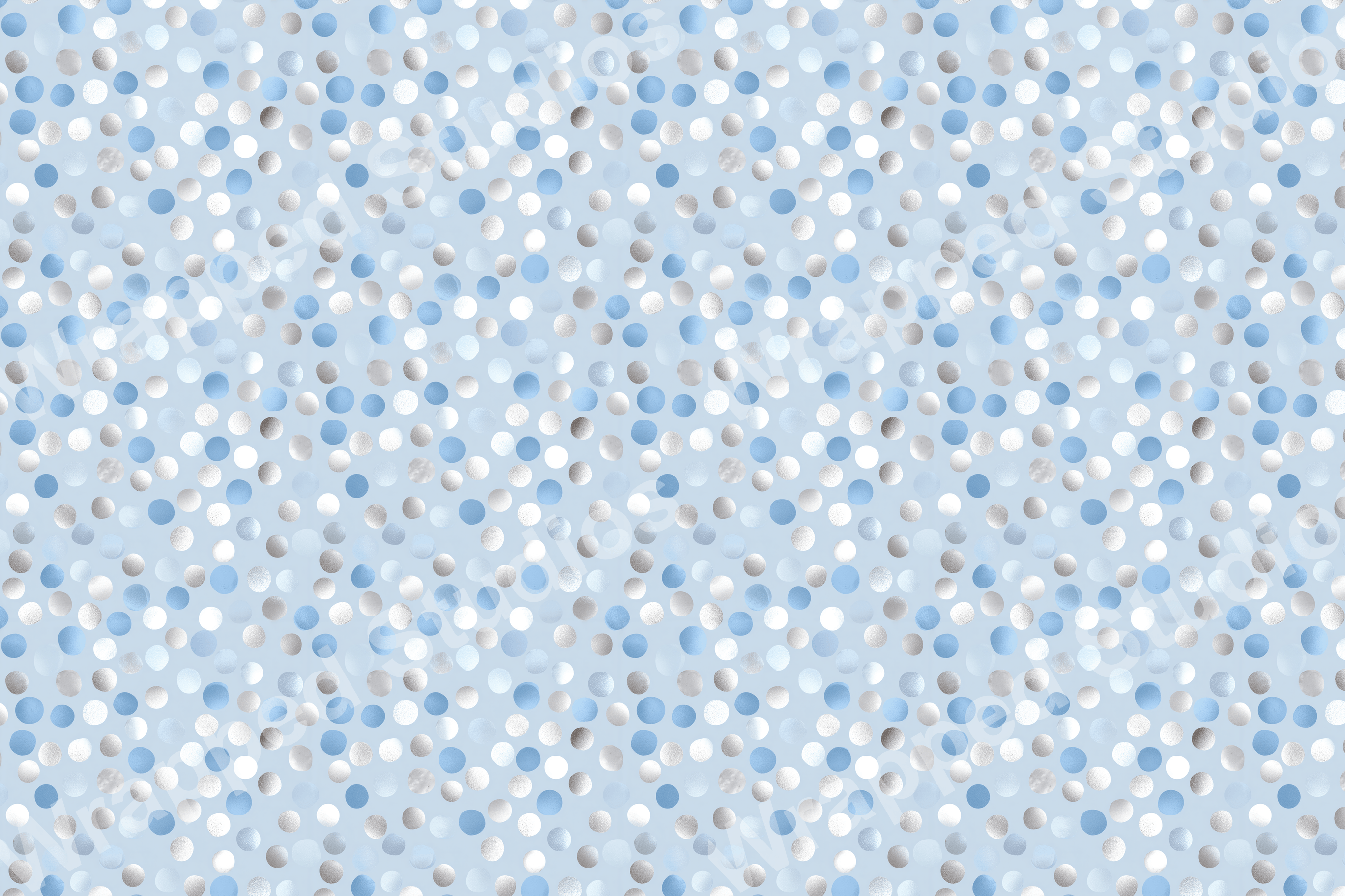 A geometric pattern of blue, white, and silver polka dots on a light blue background.
