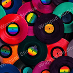 A vibrant, playful pattern of colorful vintage vinyl records with rainbow labels.