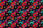 A playful, colorful pattern of overlapping vinyl records with rainbow centers, creating a vibrant retro aesthetic.