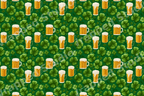 St. Patrick's Day seamless pattern with green shamrocks and frothy beer mugs on a dark green background.