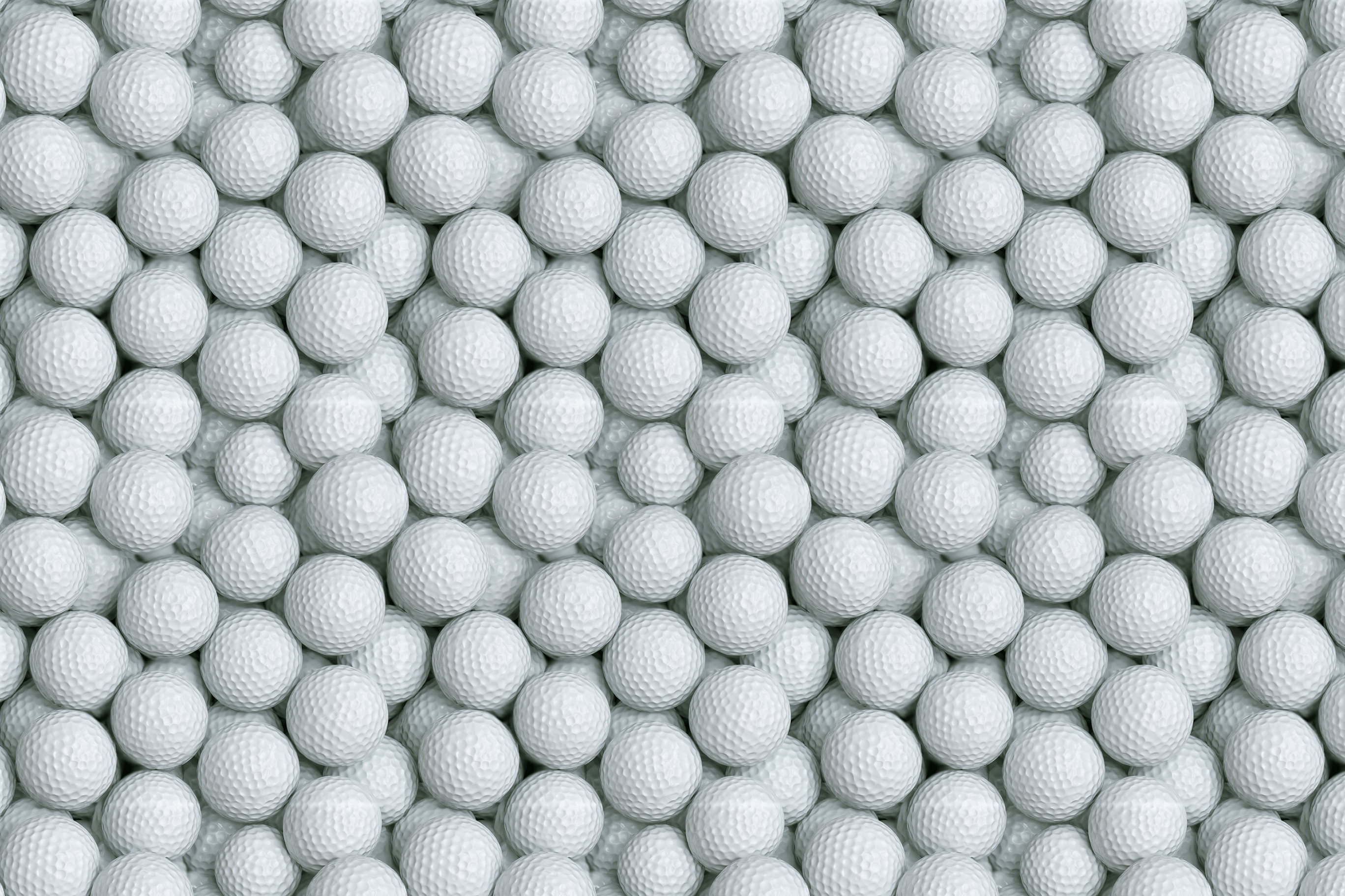 Seamless pattern of realistic white golf balls packed tightly together for a modern sports themed print.