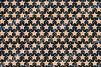 Vintage celestial star pattern with rustic cream stars on a dark navy blue night sky.