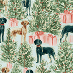 Whimsical Christmas dog pattern with painted retrievers and holiday trees on a light blue background.