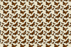 Monarch butterfly pattern with sketched details in orange and black on a cream background.