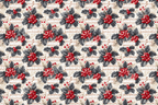 Vintage botanical Christmas pattern with red holly berries and sheet music on cream.