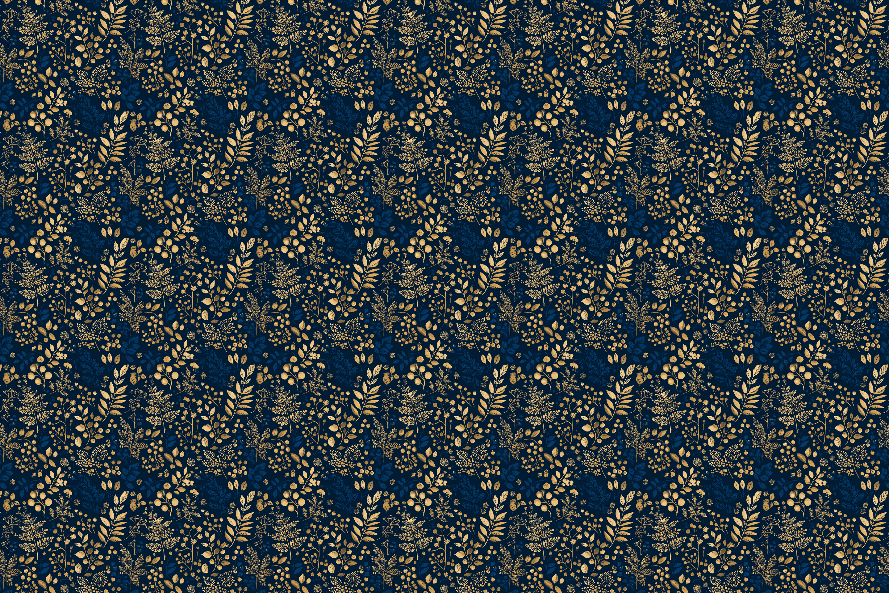 Pattern of gold leaves on a dark blue background. Wrapped Studios wrapping paper