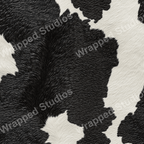 Seamless black and white cowhide pattern design.