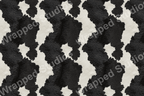 Seamless pattern features a realistic black and white cowhide print.