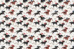 Vintage equestrian pattern featuring jockeys on galloping brown and black horses on a cream background.