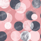 Seamless abstract pattern of overlapping textured circles in blush pink, gray, and white.
