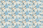 Cute teddy bears with blue bows and white floral pattern on a light blue background.