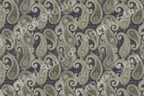 Elegant vintage paisley pattern with intricate sage green and cream motifs on a navy blue background.