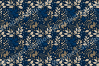 Elegant floral pattern with gold foliage and blue berries on a dark background.