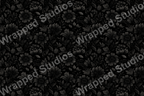 Monochrome floral pattern with elegant black botanical illustrations on a dark background.