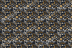 Seamless floral pattern with gold and grey flowers and foliage on a dark blue background.