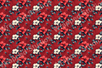 Seamless floral pattern with red and white blossoms on a dark red backdrop.