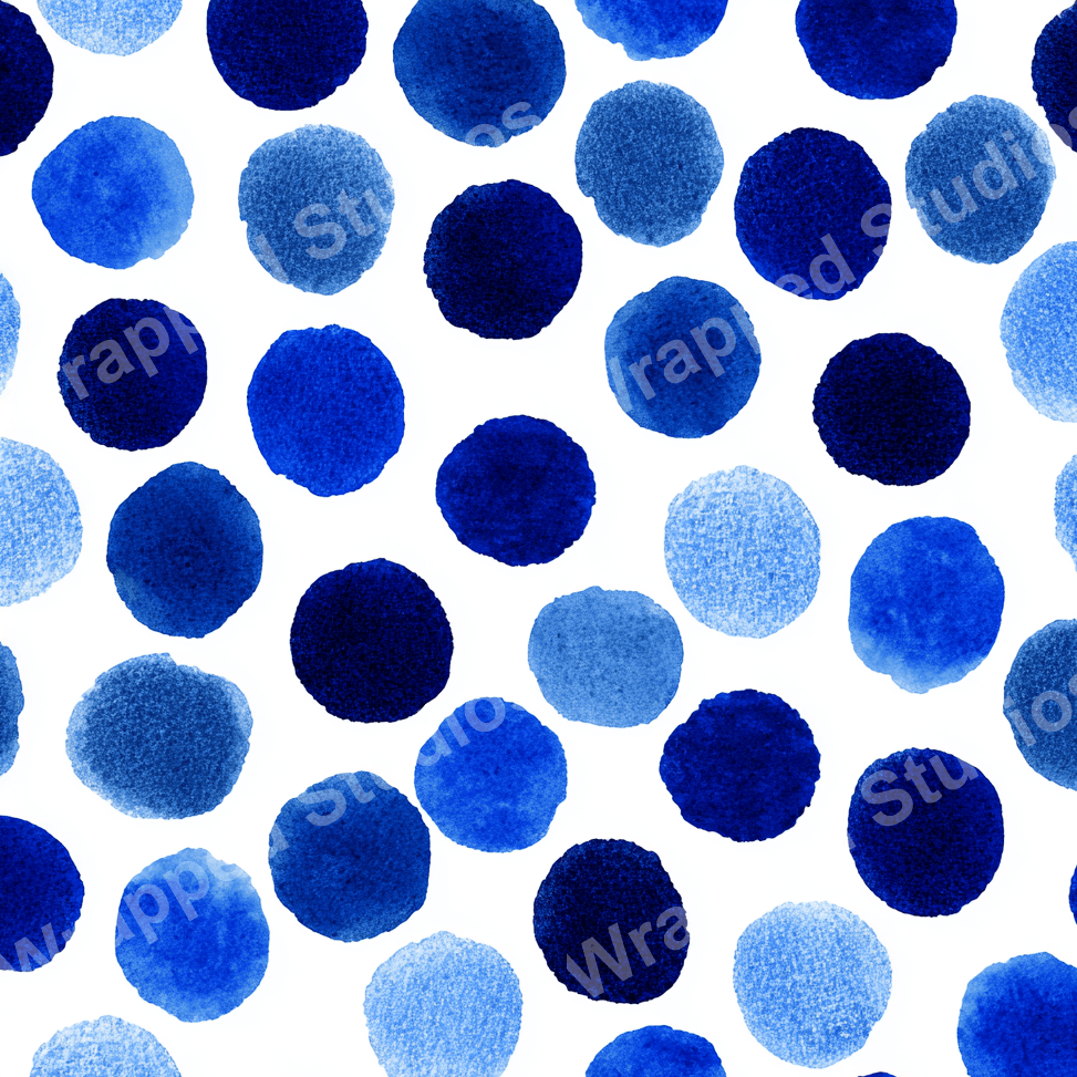 Seamless watercolor pattern of varied blue polka dots on a white background.