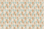 Vintage cross pattern with distressed teal, brown, and white ornate crosses on a textured beige background.
