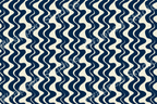 Abstract wavy stripe pattern in deep navy blue and cream, featuring a retro 60s or 70s aesthetic.