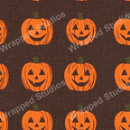 Festive Halloween pattern of smiling jack-o'-lanterns in orange and green on a brown background.