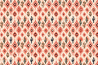 Watercolor southwestern pattern with terracotta geometric ikat diamonds and green saguaro cacti.