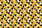 Abstract seamless pattern with black, white, and gold watercolor-style dots for a modern, playful design.