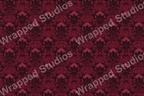 Elegant damask pattern in shades of rich red and black.