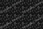 Elegant monochrome botanical pattern of stylized acanthus leaves in shades of gray.