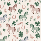 Whimsical horse seamless pattern with green clovers, pink horseshoes, and wildflowers in pastel tones.