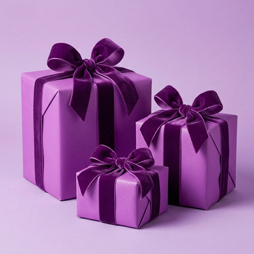 Three purple gift boxes with ribbons on a matching purple background. Amethyst Allure: Solid Color Wrapping Paper