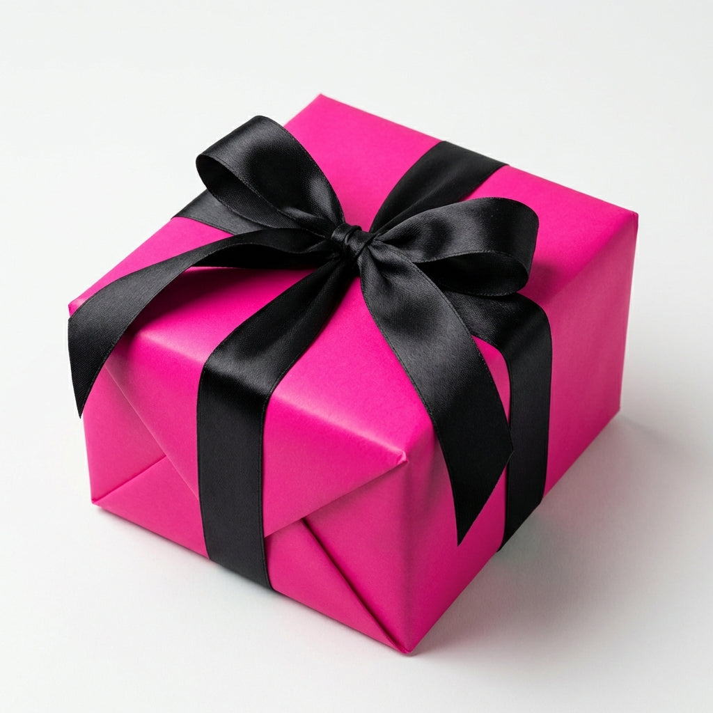 Hot pink gift box with a black ribbon on a white background