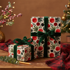 Festive red and green modern abstract Christmas wrapping paper with velvety green ribbon on gifts, ideal for holiday presents.