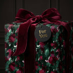 Elegant floral wrapping paper with velvet ribbon and "For You" tag. Perfect luxury gift wrap from Wrapped Studios.
