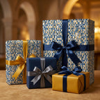 Luxury gift boxes featuring geometric mosaic wrapping paper and elegant satin ribbons from Wrapped Studios.