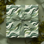 Green wave pattern wrapping paper with sage ribbon from Wrapped Studios.