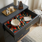 Abstract teal and orange modern wrapping paper lining a dresser drawer, by Wrapped Studios.