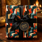 Retro guitar wrapping paper with a black satin bow and 'Music & Joy' gift tag by Wrapped Studios.