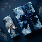 Luxury blue abstract wrapping paper on gift boxes with navy and silver bows by Wrapped Studios.