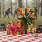 Gifts wrapped in colorful camo pattern wrapping paper with green and pink ribbon; paintball party theme.