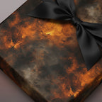 Elegant luxury gift wrap featuring an abstract gold and black design with a sleek black ribbon.