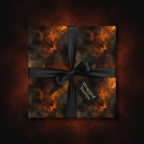 Dramatic gift box with abstract black and bronze wrapping paper and a satin black ribbon bow.